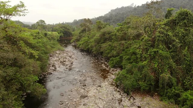 Aerial view of Rio Achiote, near Puerto Quito, Ecuador. Running through a largely human altered landscape which was formerly lowland rainforest in the biodiverse Choco Biogeographical Region