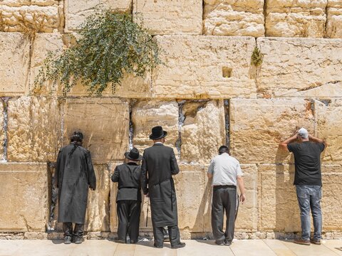 Praying Orthodox Jews at the Wailing Wall, Jerusalem, Israel