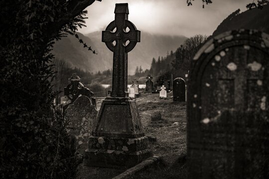 Creepy and Gloomy, Old Grave Crosses with Cloudy Sky, Glendalough, Wicklow, Ireland
