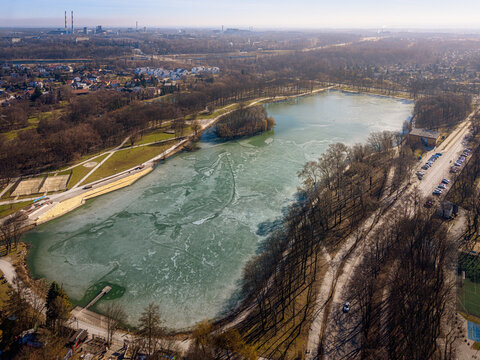 Frozen Nowa Huta Reservoir in Krakow from above on a sunny winter day, Poland