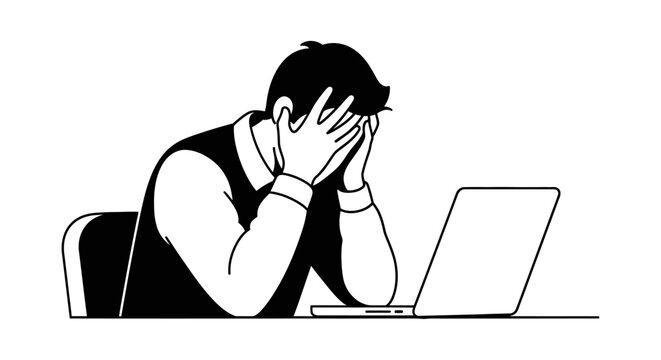 Man sitting stressed at desk with laptop.