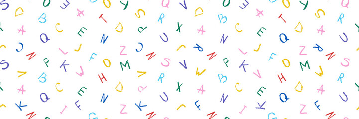 Colorful hand drawn alphabet vector seamless pattern. Bright crayon doodle scattered letters on transparent background. For children education, school supplies, wrapping paper and nursery wallpaper. © EgorTopor