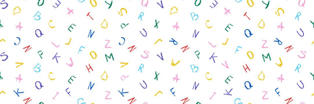 Colorful hand drawn alphabet vector seamless pattern. Bright crayon doodle scattered letters on transparent background. For children education, school supplies, wrapping paper and nursery wallpaper.