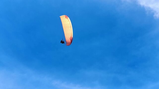 Paragliders Soaring Over Turquoise Ocean and Cliffs at Gunung Payung Beach Bali
