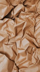 Obraz premium Crumpled brown paper texture, abstract background, natural material surface, wrinkled kraft paper, decorative texture, modern design element, realistic detailed pattern.