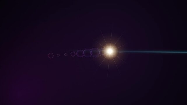 Bright light flare with geometric lens reflections on dark background