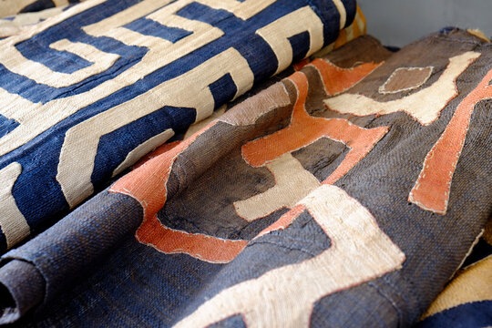 Patterned vintage African textiles close up at Paris flea market