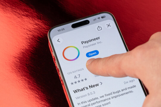 Open Payoneer app on iphone smartphone