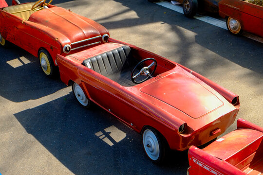 Vintage red toy cars at Paris flea market