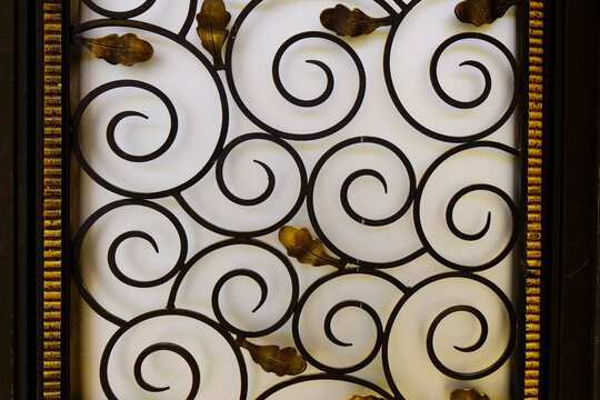 Black iron scrollwork pattern