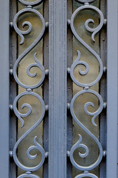 Gray wrought iron gate detail