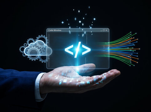 Programming code window hologram floating above palm of businessman hand with cloud computing gears and glowing fiber optic data cables against black background for software development theme.