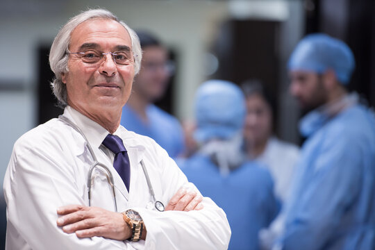 Experienced Middle Eastern eye surgeon leading a medical team in a modern hospital clinic in Egypt