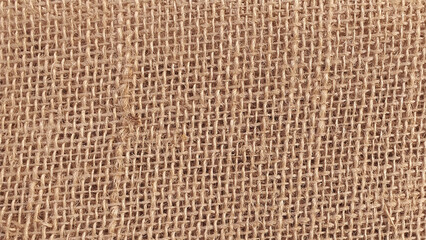 Fototapeta premium Rough texture of burlap background. Textile burlap horizontal background with natural texture