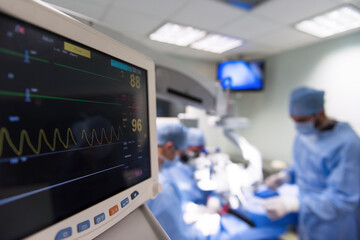Fototapeta premium Eye surgery team performing operation in a modern Middle Eastern hospital clinic in Egypt