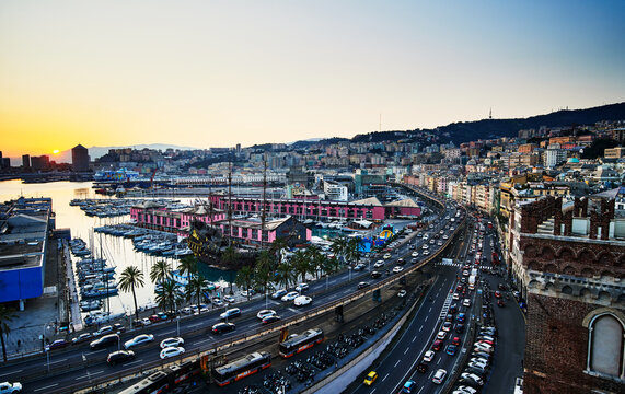 Scenic view of Porto Antico (Old Port) at sunset in Genoa, Italy, Europe 