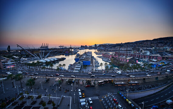 Scenic view of Porto Antico (Old Port) at sunset in Genoa, Italy, Europe 