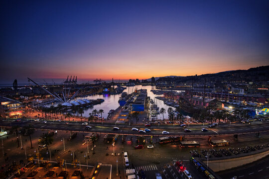 Scenic view of Porto Antico (Old Port) at dusk in Genoa, Italy, Europe 