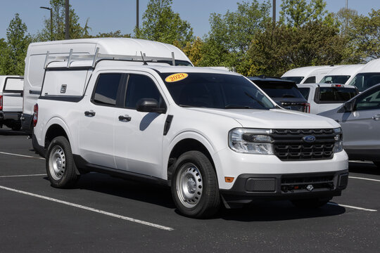 Used Ford Maverick display. With pricing concerns, Ford is buying and selling preowned vehicles to meet demand. MY:2023
