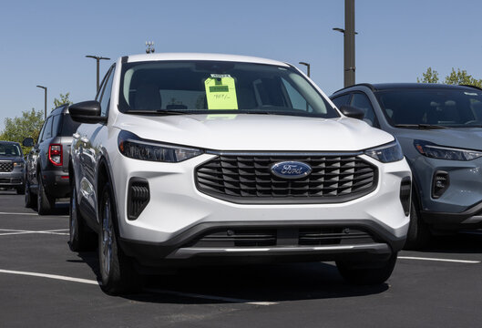 Ford Escape Active AWD SUV display at a dealership. Ford offers the Escape with a 1.5L EcoBoost engine. MY:2026
