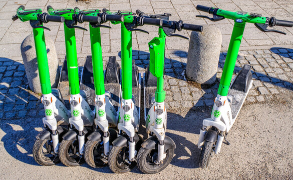 Munich, Germany - February 19: typical electro scooter at a sidewalk in munich on February 19, 2025