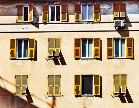 Traditional Italian architecture with yellow shutters, Genoa, Italy, Europe 