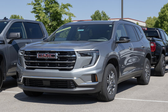 GMC Acadia Elevation FWD SUV display at a dealership. GMC offers the Acadia with a 2.5L Turbo 4-Cylinder engine. MY:2026