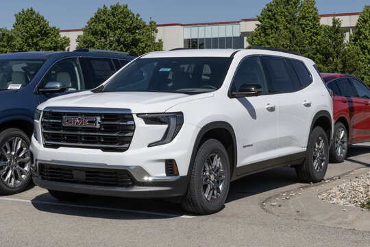 GMC Acadia Elevation FWD SUV display at a dealership. GMC offers the Acadia with a 2.5L Turbo 4-Cylinder engine. MY:2026