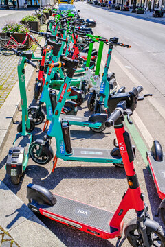 Munich, Germany - May 19: typical electro scooter at a sidewalk in munich on May 19, 2025
