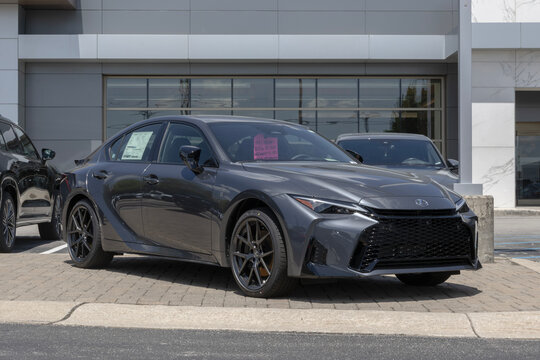 Lexus IS 350 F Sport Design AWD sedan display at a dealership. Lexus offers the IS350 with a 311HP 3.5L V6 engine. MY:2026