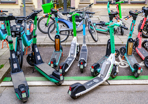 Munich, Germany - July 22: typical electro scooter at a sidewalk in munich on July 22, 2025