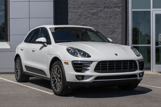 Used Porsche Macan display. With pricing concerns, Porsche is buying and selling preowned vehicles to meet demand. MY:2018