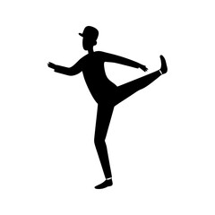 Silhouette of person dancing ballet, elegant pose with one leg extended © MASUDA