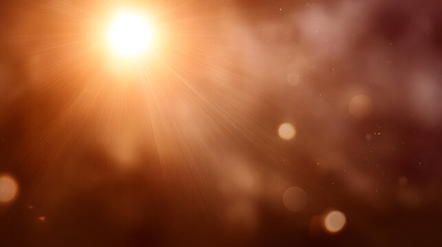 A radiant abstract background featuring a strong golden flare and scattered bokeh lights against deep warm copper tones