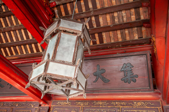 A lamp in the Temple of Literature, a historical relic in Hanoi, represents the strong emphasis on education and learning in Vietnamese culture.