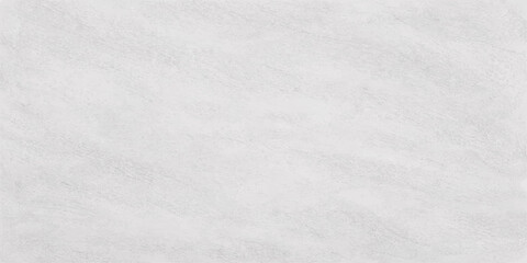 A closeup macro of blank white snow and paper texture reveals a cold frost pattern on a gray winter surface, creating a textured wallpaper material for a Christmas backdrop © Rehaan