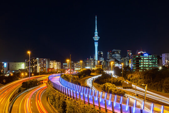 Auckland, New Zealand - August 16, 2024 : Long exposure with light trails of Sky Tower in beautiful Night Light. A tallest building in New Zealand