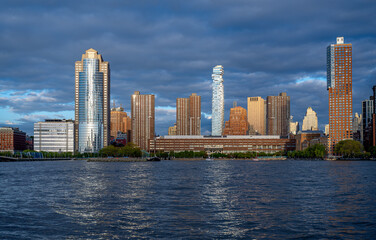 Fototapeta premium Tribeca skyline with 56 Leonard Street Jenga Tower. Lower Manhattan cityscape featuring the unique cantilevered skyscraper and residential buildings from the water.