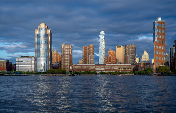 Tribeca skyline with 56 Leonard Street Jenga Tower. Lower Manhattan cityscape featuring the unique cantilevered skyscraper and residential buildings from the water.