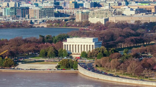 Lincoln memorial aerial view featuring historic greek revival architecture marble columns potomac river scenic waterfront and washington dc cityscape.