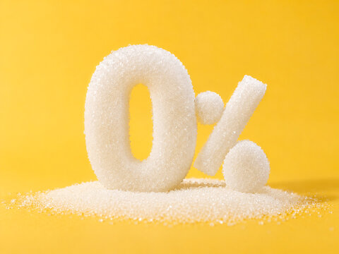 White zero percent symbol in sugar granules on a yellow background.