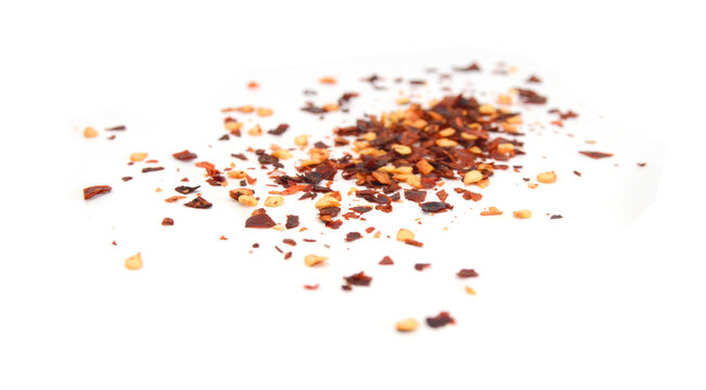 Chili flakes on white background