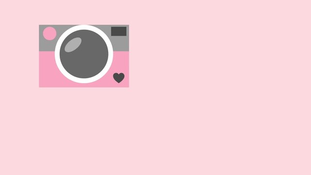 Cute Pink Camera with Heart Detail on Pastel Pink Background