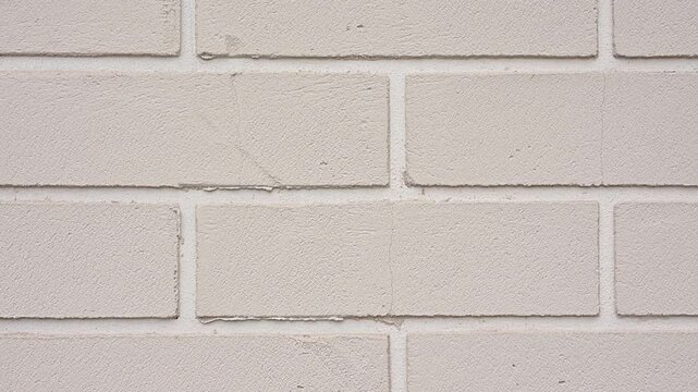 White brick wall texture background sliding downwards. Urban building material and construction abstract HD video pattern Full