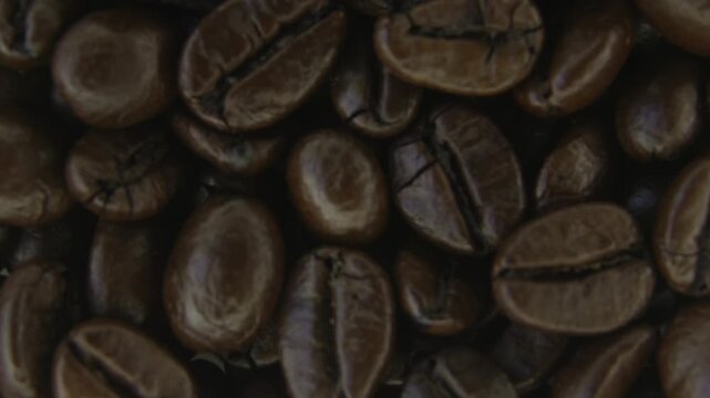 Rotating Coffee Beans Texture Macro Background Loop.