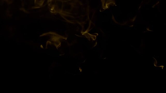 Scary Halloween fire and smoke in the dark night Gold abstract background rays