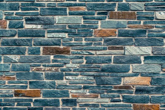 Stone Wall Texture shown clearly in the frame in an outdoor setting, in a clean visual environment, under daylight, with a natural mood, suitable for marketing, editorial, and digital storytelling.