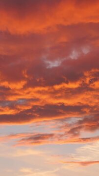 Orange and red clouds during dramatic sunset