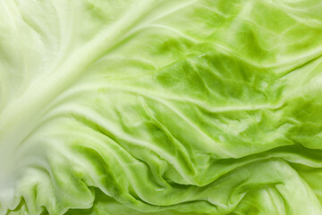Obraz premium Fresh ripe cabbage as background, top view