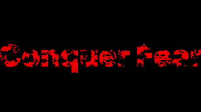 Text reads Conquer Fear in a distressed red font placed centered on a solid black background field.
